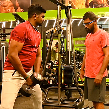 Dumbbell Squat Exercise at FitnessZone